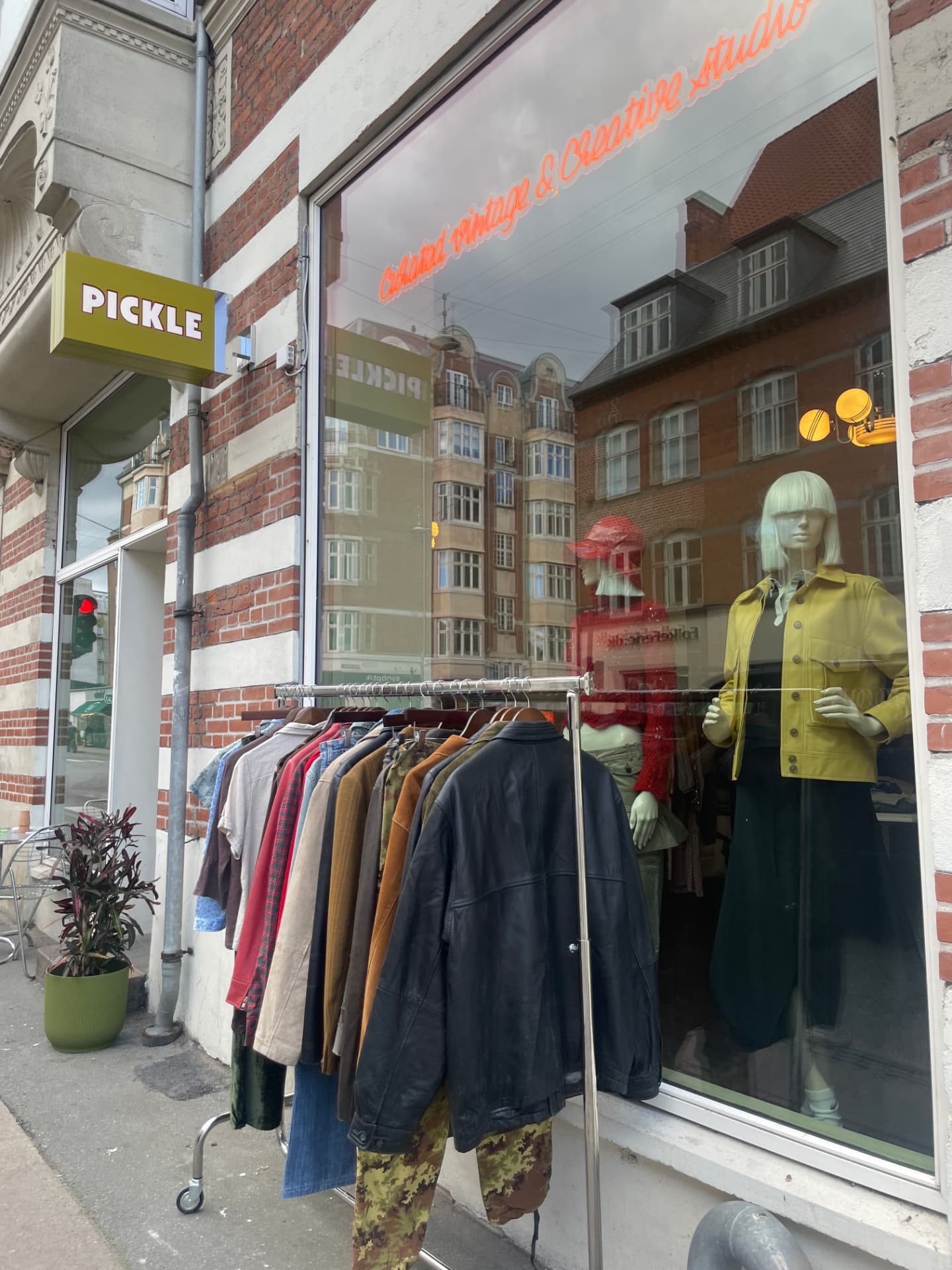 A secondhand shop with its pieces on the rack